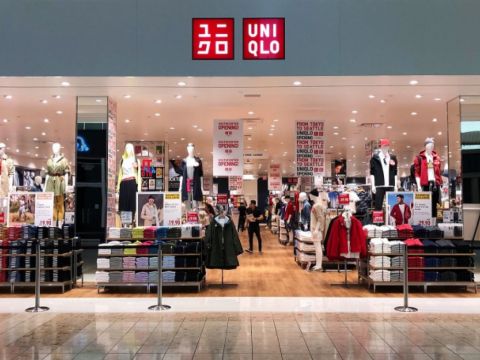 Why did Uniqlo take 2 years to open its first store in Vietnam?